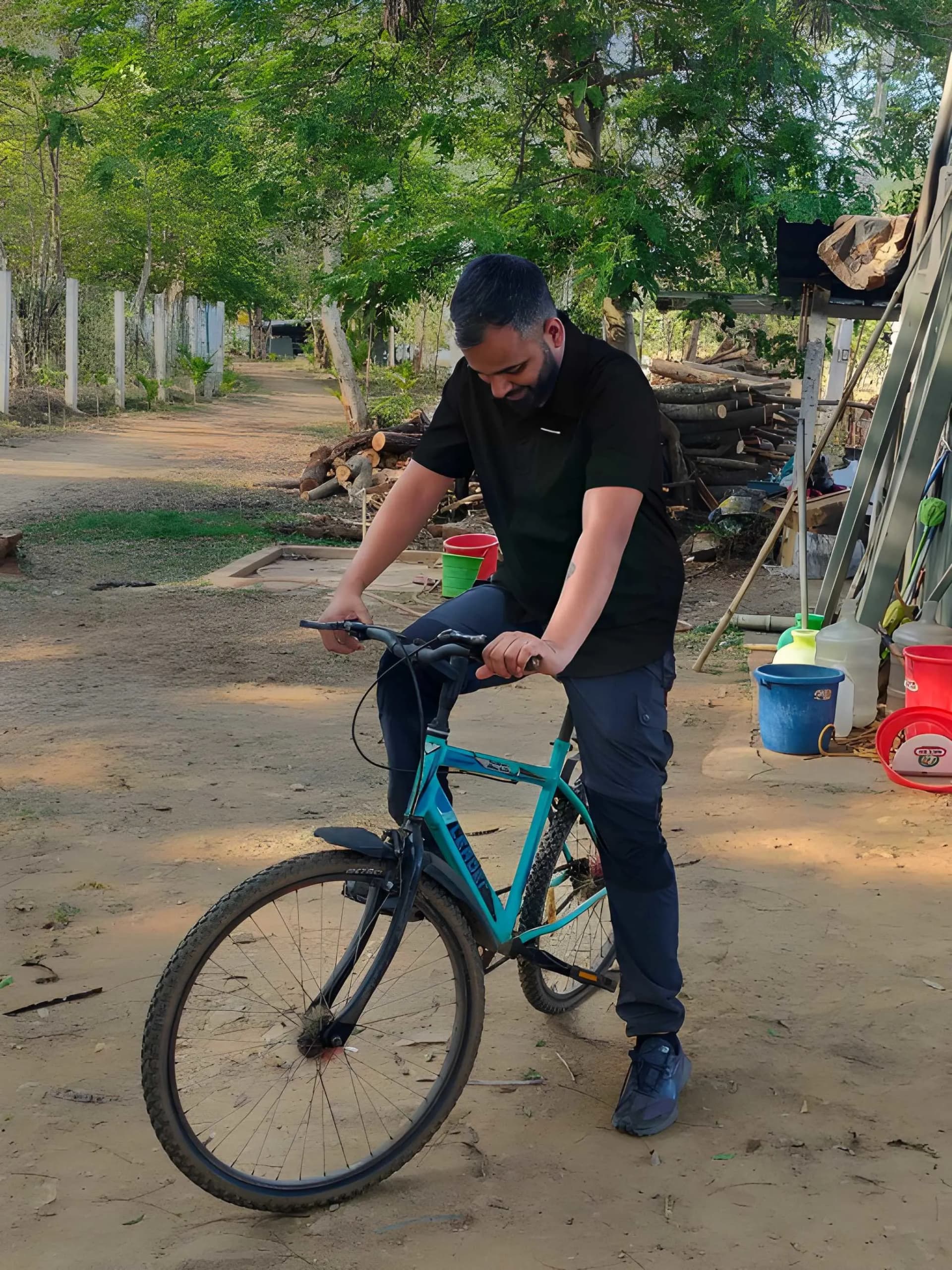 Cycling trail at dawn along the Kabini backwaters — a morning activity at Kabini Kaanana
